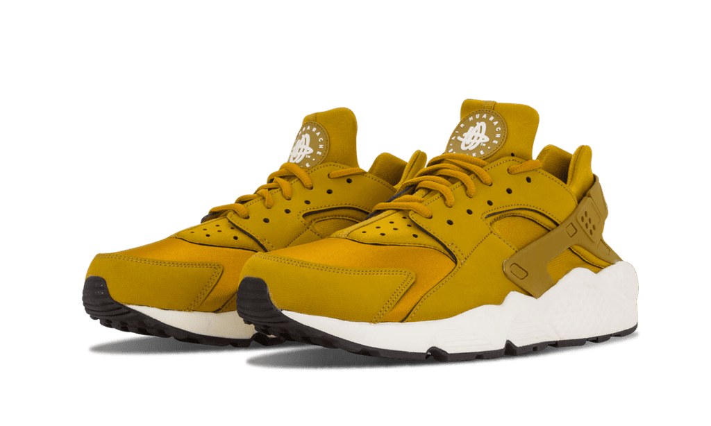 NIKE WOMENS AIR HUARACHE RUN MNS Womens "Bronzine" 634835 700 from Stadium Goods